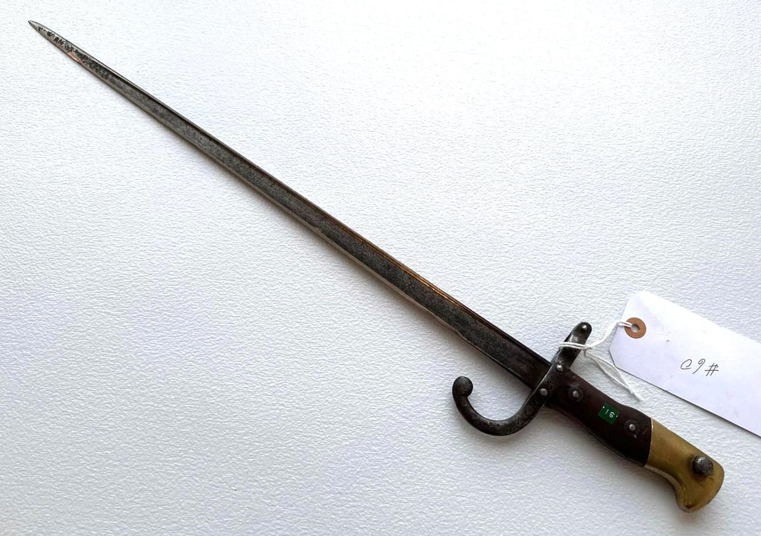 FRENCH M1870 GRAS TBACK BAYONET: The French M1870 Gras Tback Bayonet is an iconic piece of military history, representing a significant shift in French infantry weaponry during the late 19th century. This bayonet is notable for its u