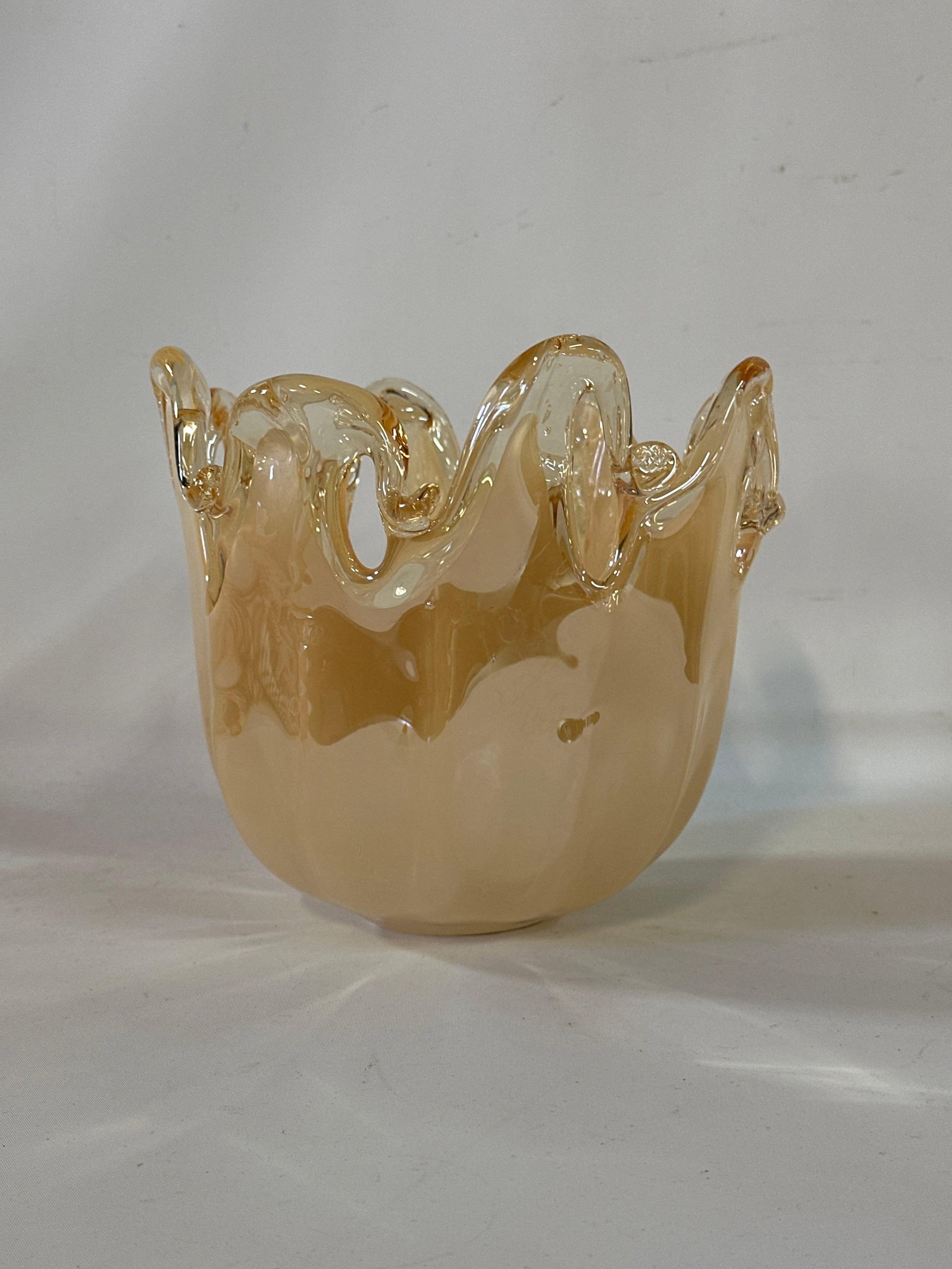 AMBER IRIDESCENT MURANO HANDKERCHIEF ART GLASS VASE: This striking orange beige tone iridescent Murano handkerchief art glass vase is a beautiful example of mid-20th century Italian glass artistry. It is Marked on the underside with the original label. 