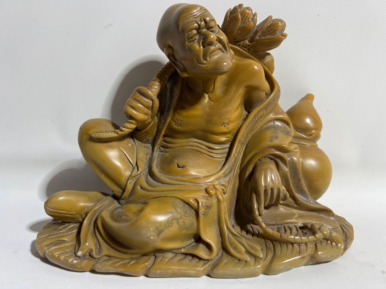 VINTAGE CARVED STONE LO HAN FIGURE WITH LOTUS FLOWERS (CIRCA 1860) (1 of 11)