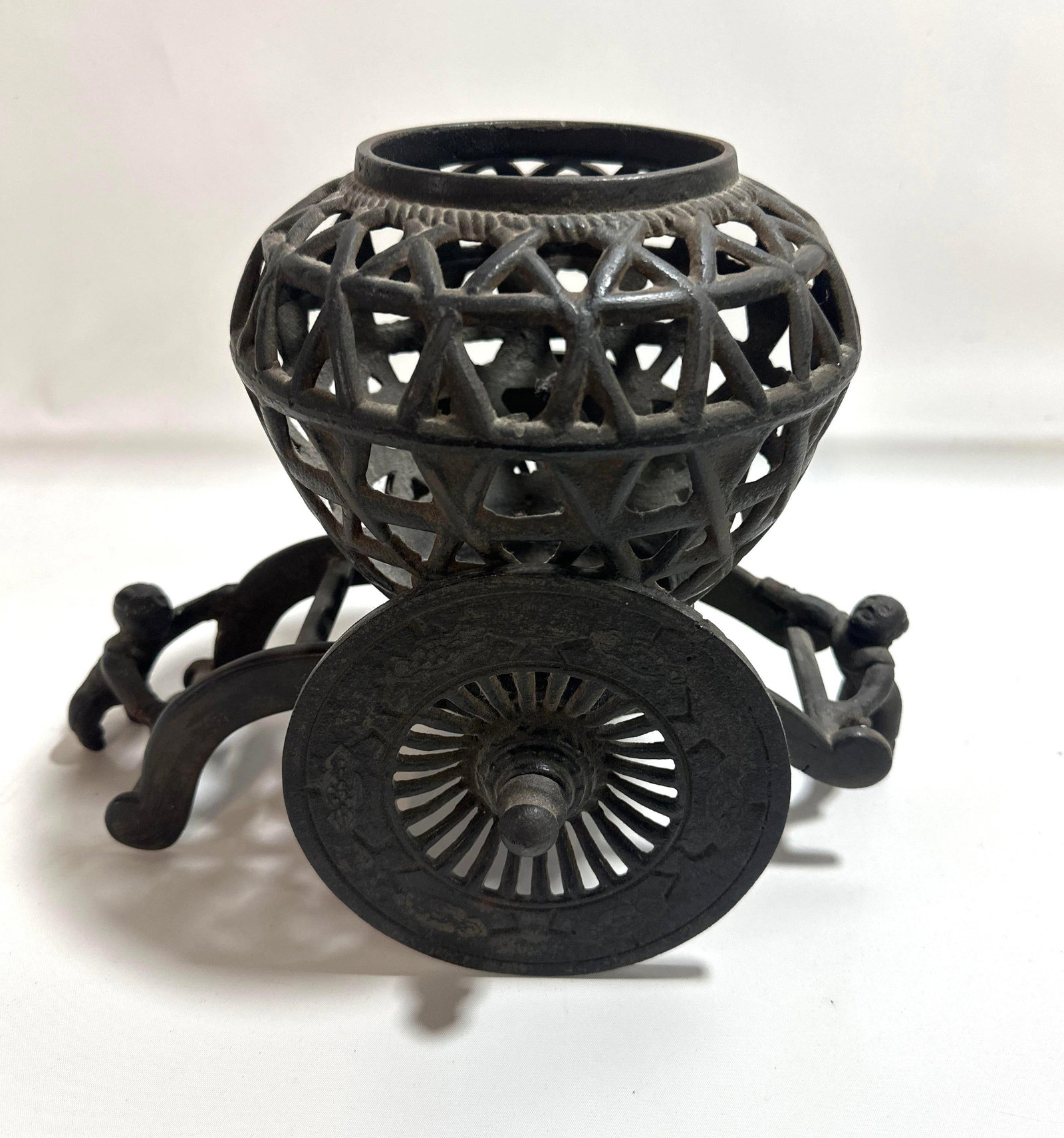VINTAGE CAST IRON INCENSE BURNER: This captivating vintage cast iron incense burner is a unique and functional piece that blends Eastern-inspired design with rustic charm. Crafted from durable cast iron, the burner features a distinct