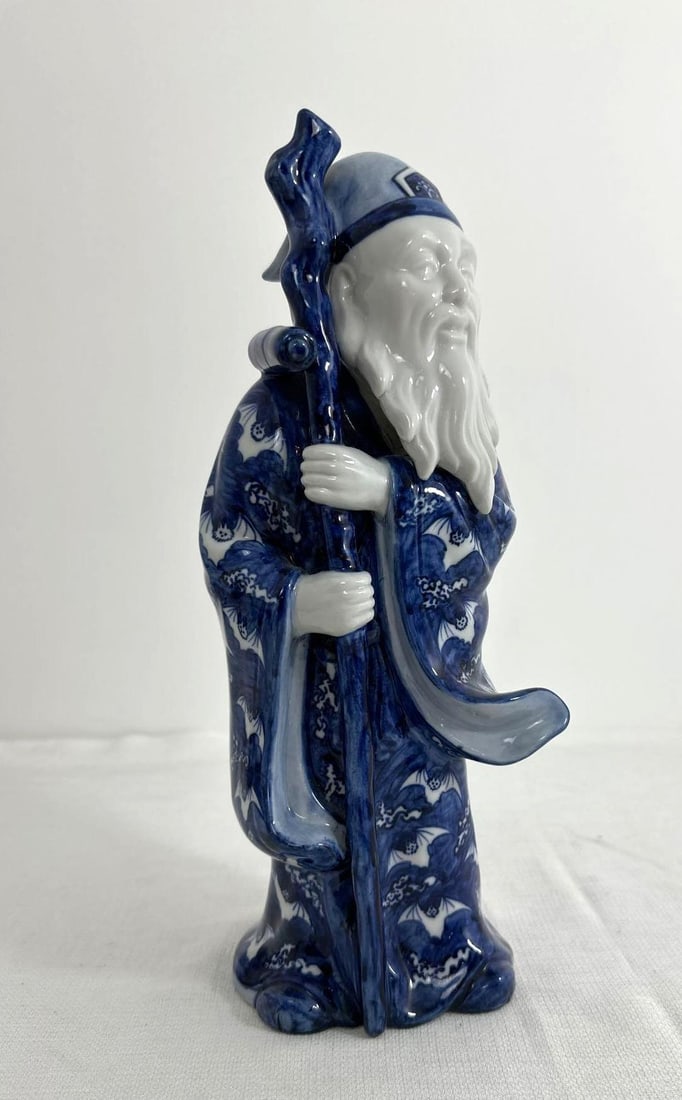 CHINESE BLUE AND WHITE PORCELAIN STATUE (1 of 5)