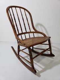 ANTIQUE OAK ROCKING CHAIR WITH CANE SEAT