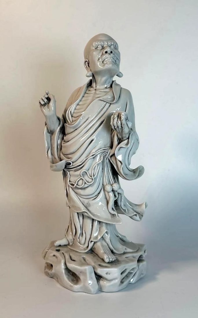 BLANC DE CHINE PORCELAIN FIGURE OF BUDDHIST ARHAT OR LUOHAN (1 of 8)