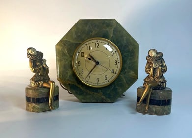 VALUE LOT: ART DECO ONYX SPIN CLOCK & FIGURAL HARLEQUIN GARNITURES, WHITEHALL AND HAMMOND