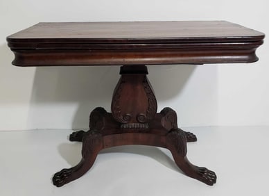 19TH CENTURY EMPIRE MAHOGANY FOLDING CARD TABLE WITH PAW FEET AND LYRE BASE