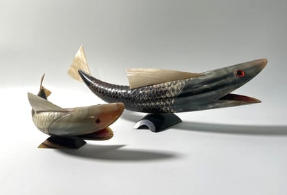 CARVED NATURAL HORN FISH SCULPTURES