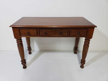 VINTAGE TEAK TWO DRAWER DESK WITH TURNED LEGS