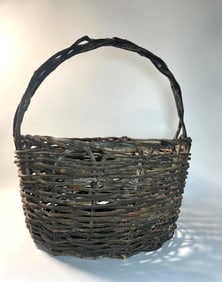 LARGE ANTIQUE HANDWOVEN TWIG BASKET