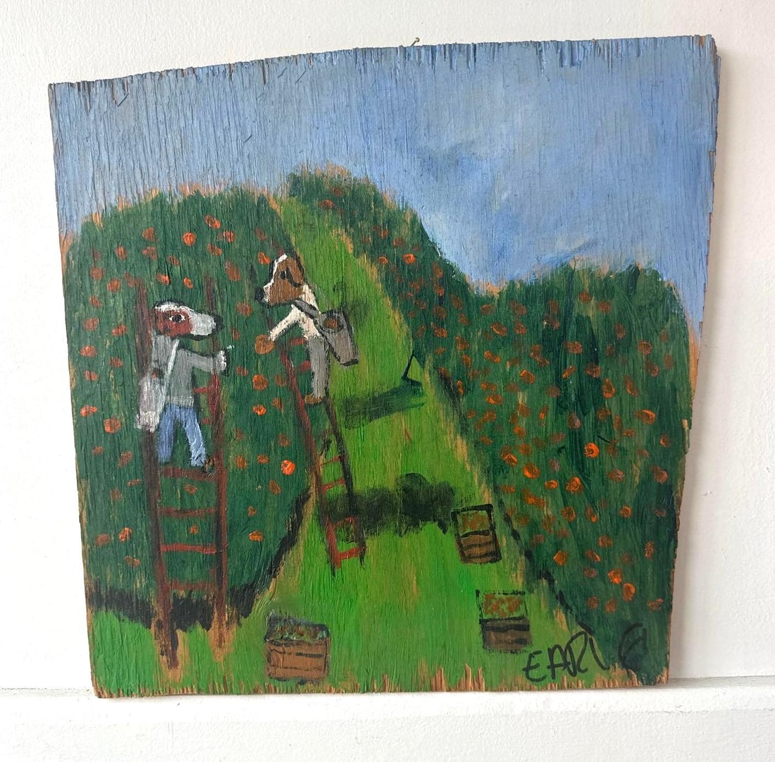 EARL SWANIGAN PAINTING ON BOARD DOGS PICKING APPLES (1 of 5)