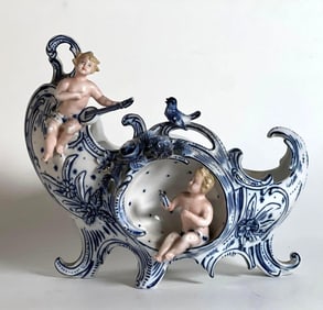 VINTAGE GERMAN PORCELAIN CENTERPIECE BOOT VASE WITH CHERUBS