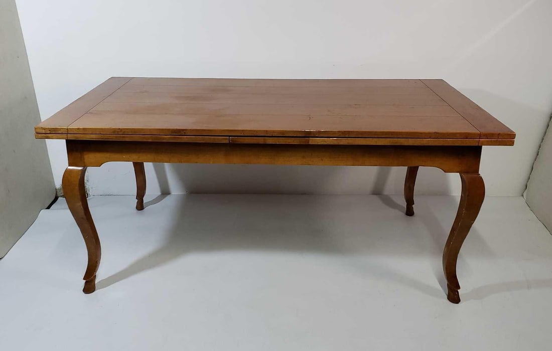 GUIDO ZICHELE FOR BLOOMINGDALES ITALIAN OAK FRENCH COUNTRY DRAW LEAF DINING TABLE: A vintage extendable dining table with cabriole shape hoof legs. Dimensions: 31.5"H X 72"W X 36"D CLOSED; 152"W OPEN Artist or Maker: Unknown Notes:Although care is taken to photograph and describe th