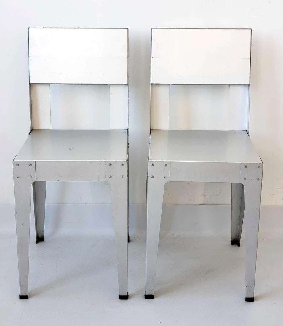 PAIR OF PIET HEIN FOR LENSVELT ALUMINUM DINING CHAIRS (1990'S): A pair of Piet Hein for Lensvelt PHA201 aluminum dining chairs, designed in the 1990s, featuring a minimalist aesthetic with a square backrest and seat, and a brushed finish. Dimensions: Width 36 cm