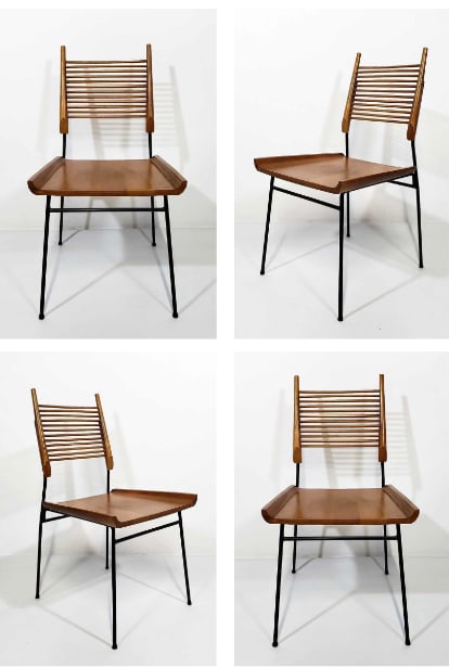 SET OF FOUR PAUL MCCOBB FOR WINCHENDON MAPLE AND IRON "SHOVEL CHAIRS": A Set of Paul McCobb "Shovel Chairs" designed for Winchendon, featuring a maple seat and backrest with horizontal slats, supported by a black iron frame with tapered legs. Dimensions: 33.75" x 18.25"
