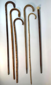 COLLECTION OF SIX VINTAGE CARVED WOODEN CANES