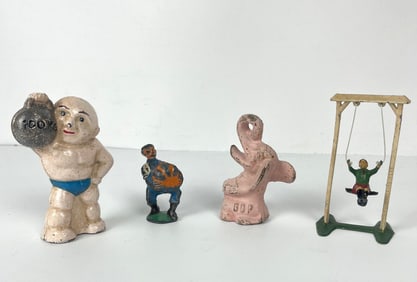 COLLECTION OF CAST IRON FIGURINES