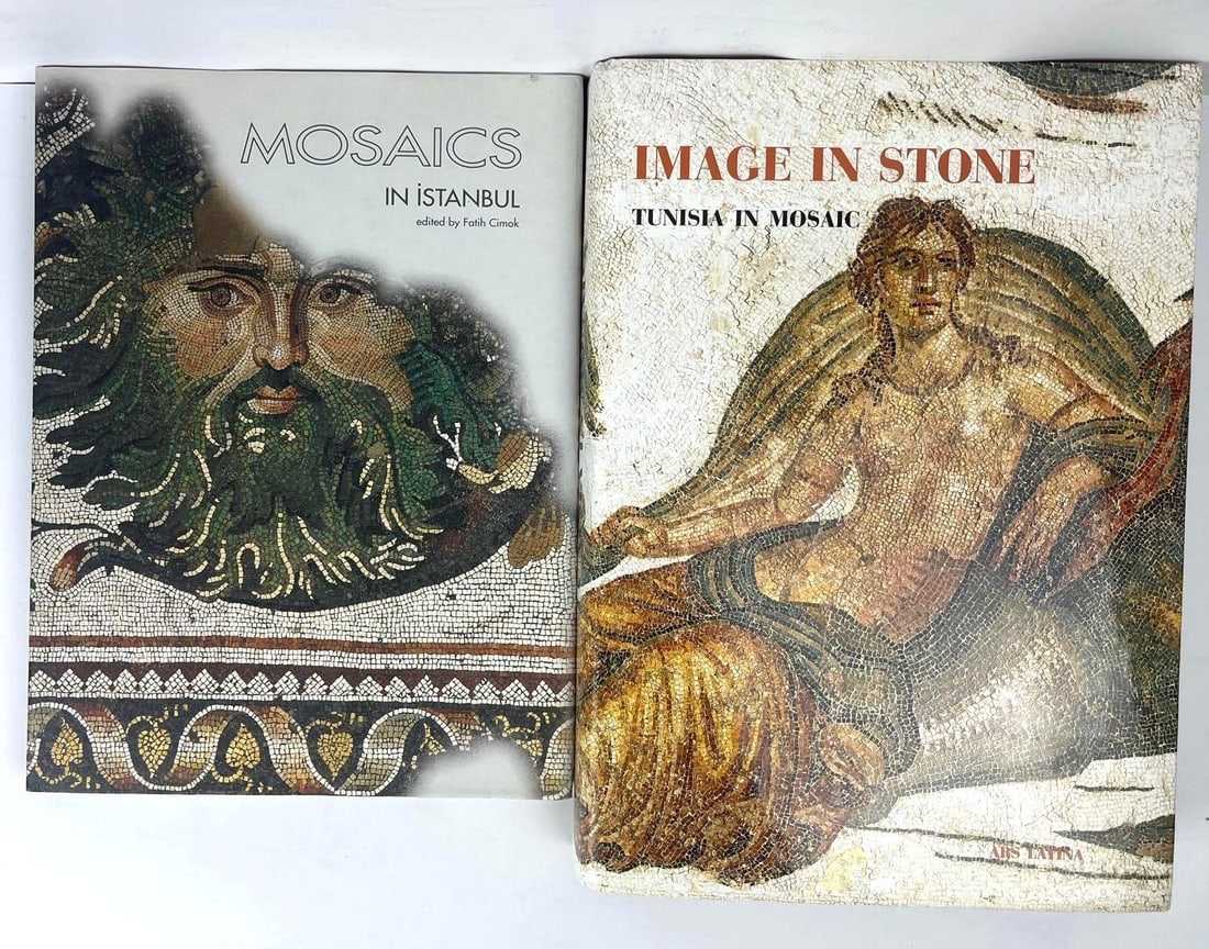 PAIR OF BOOKS ON MOSAICS: A pair of hardcover books about mosaics, one titled "Mosaics in Istanbul" and the other "Image in Stone: Tunisia in Mosaic." Dimensions: IMAGE IN STONE BY KHADER : 14" X 9.75" X 2" MOSAICS IN INSTAN