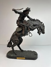 FREDERIC REMINGTON “WOOLY CHAPS" (?) BRONZE SCULPTURE
