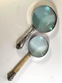 PAIR OF MAGNIFYING GLASSES - ONE ANTIQUE STERLING SILVER