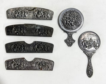 VALUE LOT: DANISH MARKED REPOUSSE COMB AND MIRROR SETS, FOUR COMBS IN SILVER PLATE