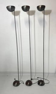 VALUE LOT TRIO OF MCM STEEL FLOOR LAMPS: Three halogen lamps in the style of Robert Sonneman's for George Kovac Torchierre. Dimensions: 71.5" Artist or Maker: Unknown Notes: Although care is taken to photograph and describe the item, abse
