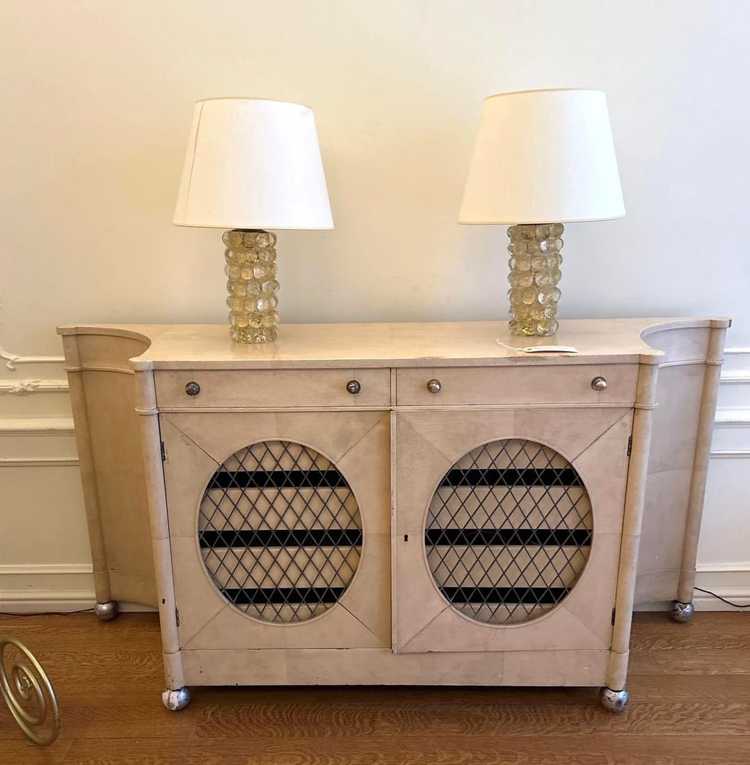 UNIQUE CURVED PINK CRACKLE FINISH LACQUER SIDEBOARD / CREDENZA WITH LATTICE DOOR PANELS: A unique sideboard or credenza with a curved pink faux stone exterior in a crackled lacquer and doors featuring a lattice design. Lacquered craqueleure finish. From the Alberta Ferretti Showroom/ VIP