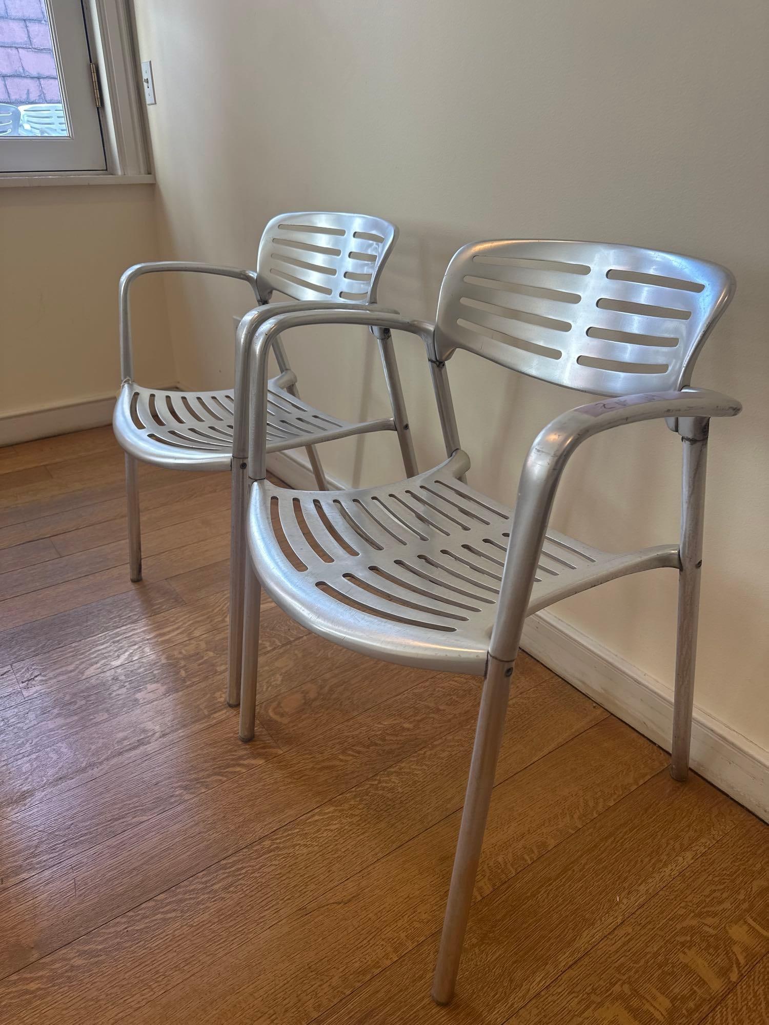 JORGE PENSI TOLEDO CHAIR - ALUMINUM (LOT 2 OF 17 ): A pair of Jorge Pensi Toledo chairs, constructed from aluminum with a slatted seat and back. From the Moschino NYC showroom. Dimensions: W26 D29 H31 Artist or Maker: Jorge Pensi This item is