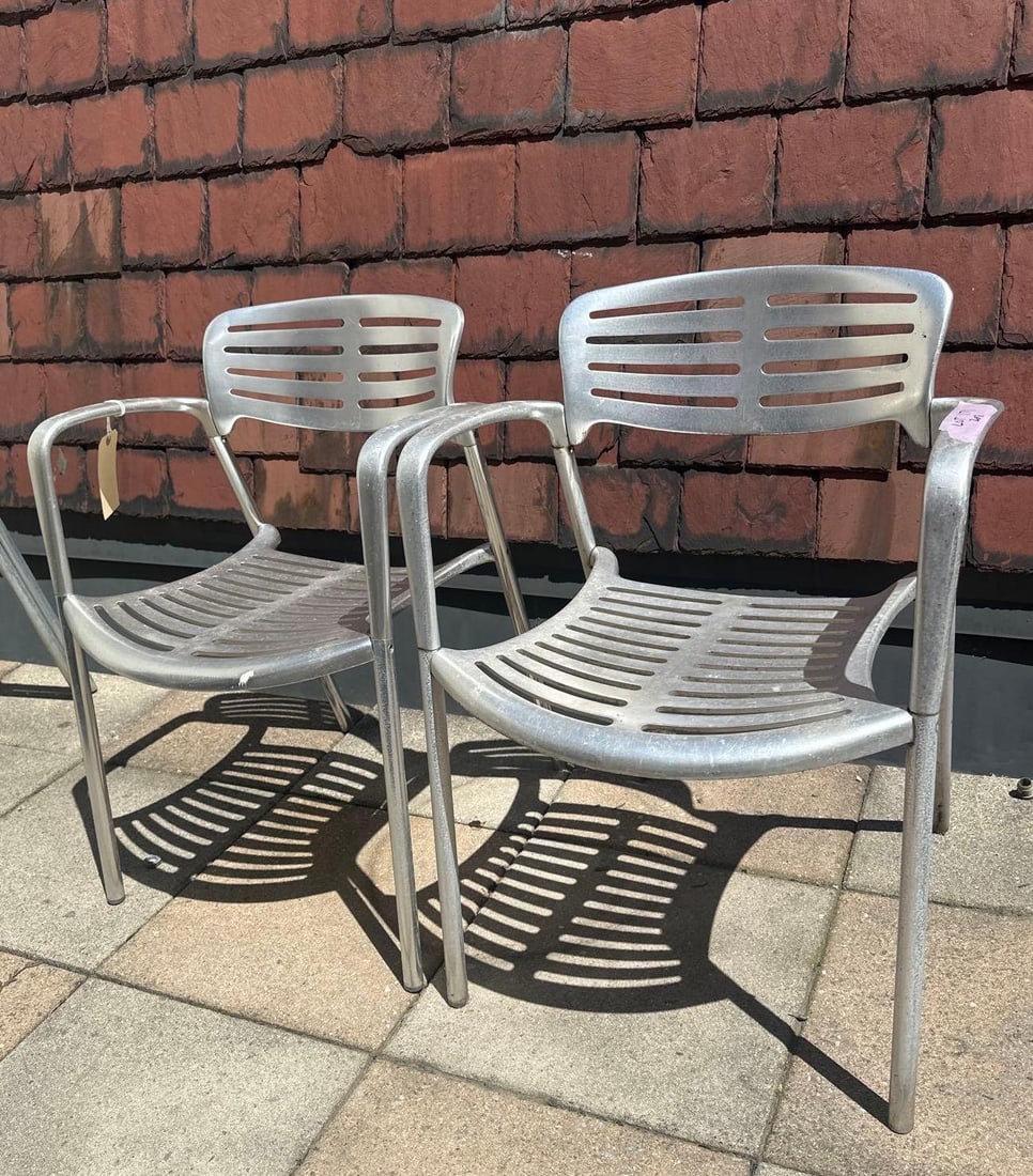 JORGE PENSI TOLEDO CHAIR - ALUMINUM(LOT 4 OF 17 ): A pair of Jorge Pensi Toledo chairs, constructed from aluminum with a slatted seat and back. This pair was used outdoors, so finish is dulled and aluminum is discolored, see photos. From the Moschin
