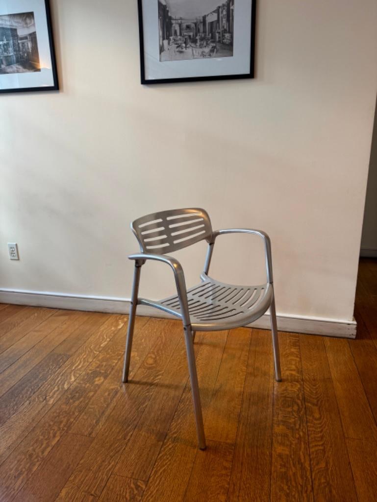 JORGE PENSI TOLEDO CHAIR - ALUMINUM (9 OF 17): A pair of Jorge Pensi Toledo chairs, constructed from aluminum with a slatted seat and back. From the Moschino NYC showroom. Dimensions: Artist or Maker: Jorge Pensi This item is part of our Itali
