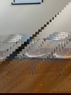 JORGE PENSI TOLEDO CHAIR - ALUMINUM (10 OF 17 ): A pair of Jorge Pensi Toledo chairs, constructed from aluminum with a slatted seat and back. From the Moschino NYC showroom. Dimensions: W26 D29 H31. ]Artist or Maker: Jorge Pensi This item is par