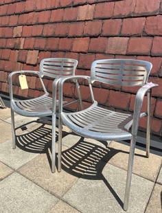 JORGE PENSI TOLEDO CHAIR - ALUMINUM (LOT 11 OF 17 ): A pair of Jorge Pensi Toledo chairs, constructed from aluminum with a slatted seat and back. This pair was used outdoors, so finish is dulled and aluminum is discolored, see photos. From the Moschino