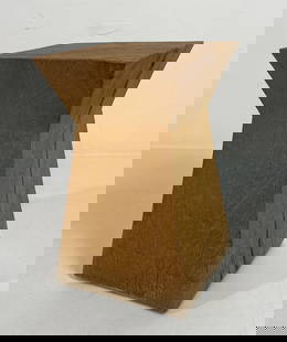 CHRISTIAN LIAIGRE NAGATO STOOL IN NATURAL WOOD FINISH: A Christian Liaigre Nagato stool, crafted from wood with a natural finish, featuring a distinctive geometric shape. From the Moschino NYC showroom. Dimensions:10" x 10" x 19" h Artist or M