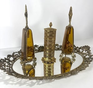 VINTAGE ORMOLU VANITY SET WITH AMBER PERFUME BOTTLES AND MIRRORED TRAY