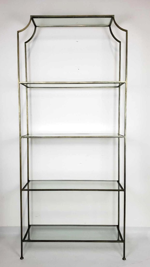 MODERN WORLDS AWAY "CHLOE" STYLE FIVE-TIER STEEL AND GLASS ETAGERE: A modern five-tier etagere, reminiscent of the "Chloe" style by Worlds Away, features a brass-toned steel frame with a decorative arched top and four clear glass shelves. Dimensions: 82"h x 36"w x 12