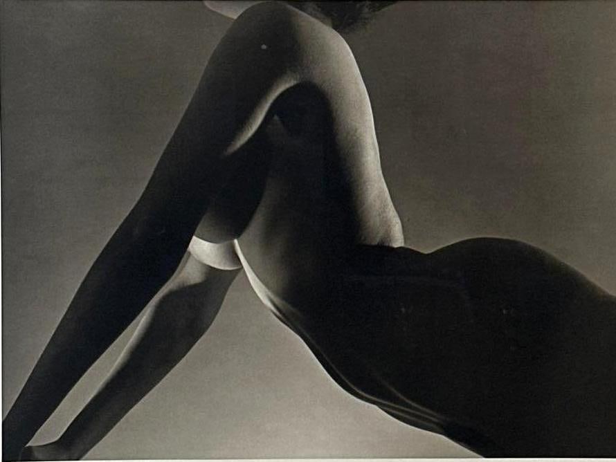 HORST P. HORST NUDE PHOTOGRAPH W/ EMBOSSED SIGNATURE IN MARGIN: Black and white photo of a woman's torso in profile Dimensions: 14”x19” image print 22.5x26.5” overall Artist: Horst P. Horst (1906-1999) Notes: Although care is taken to