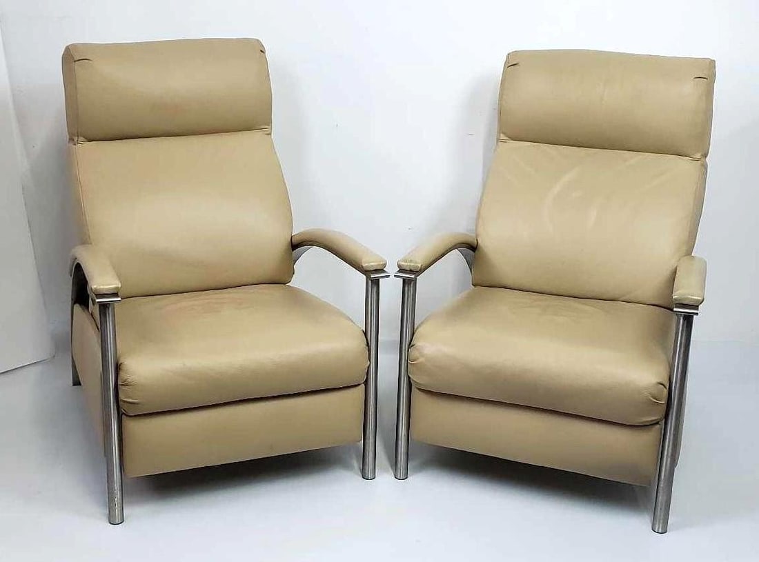 PAIR OF VINTAGE ETHAN ALLEN CONTEMPORARY LEATHER RECLINING CHAIRS: A pair of vintage Ethan Allen contemporary leather reclining chairs. Dimensions: 42"h x 27.5"w x 37.5"d Artist or Maker: Ethan Allen Notes: Although care is taken to photograph and desc