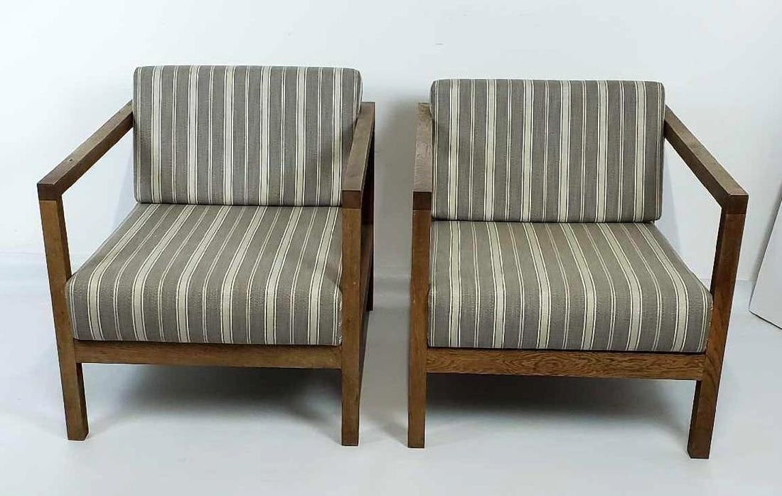 PAIR OF BYRON E15 TEAK CHAIRS REUPHOLSTERED IN OUTDOOR PERFORMANCE HOLLAND & SHERRY FABRIC: A pair of Byron E15 teak chairs, expertly reupholstered in high-quality outdoor performance fabric by Holland & Sherry, blending durable design with luxurious comfort. Dimensions: 29"h x 26.7