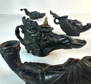 FOUR ANTIQUE FIGURAL BRONZE OIL LAMPS