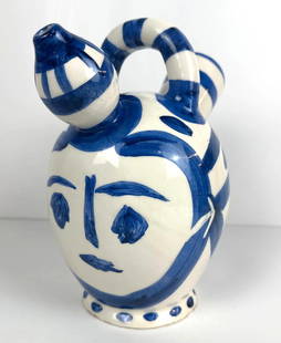 PABLO PICASSO | PICHET À GLACE (A. R. 142): Terre de faïence pitcher, 1952, numbered 21/100, inscribed &#39;Edition Picasso&#39; and &#39;Madoura&#39;, glazed and painted, with the Edition Picasso and Madoura stamps  Dimensions: 11.5&#34; Tall
