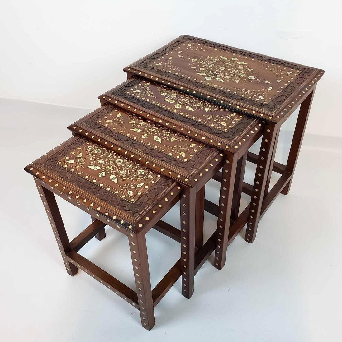 SET OF FOUR VINTAGE INTRICATE CARVED AND INLAID NESTING TABLES (1 of 10)