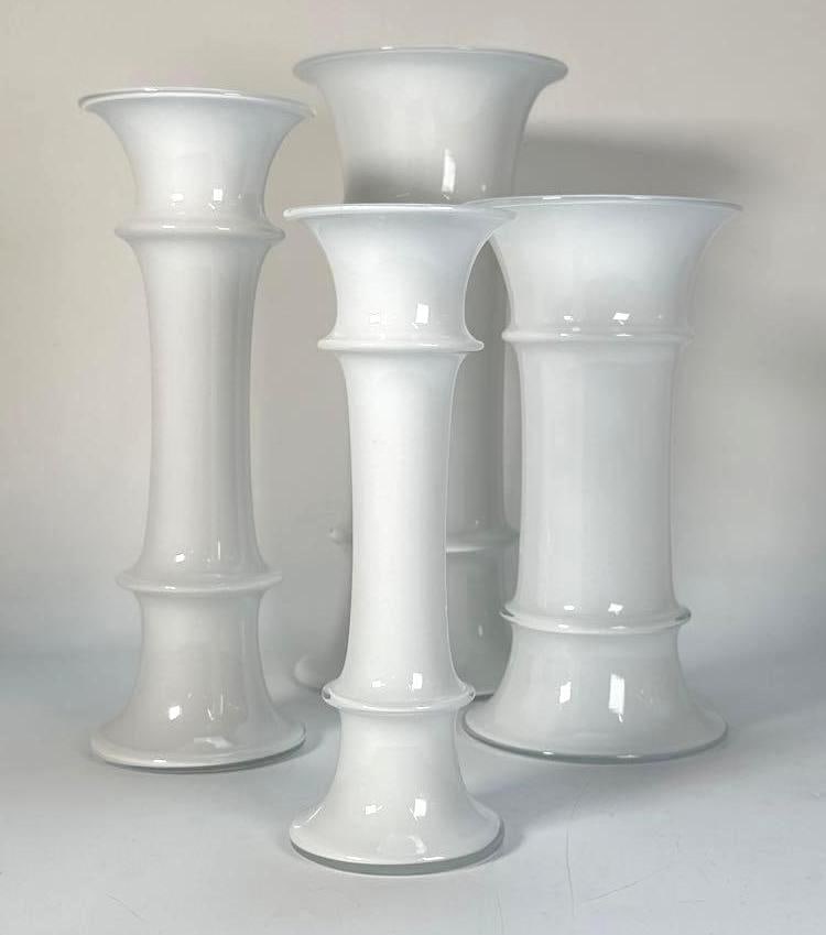 SET OF FOUR HOLMEGAARD MB VASES DENMARK: From the living estate of Joseph Rodano: Vintage Holmegaard MB Opal Glass Vase Quartet Dimensions: Largest: 12" tall x 5" Dia Artist/Maker: Michael Bang for Holmegaard, Notes: Although care