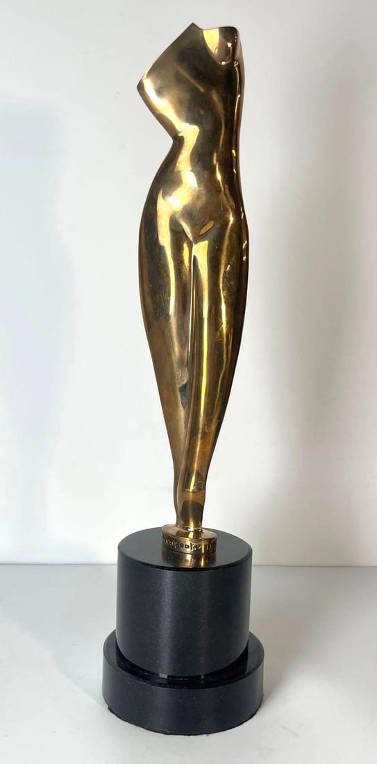 AFTER ARCHIPENKO -TORSO SCULPTURE: Rendered with Archipenko's characteristic fragmentation and reassembly of the human form mounted on a round shape base. . This piece showcases the influential sculptor's groundbreaking approac