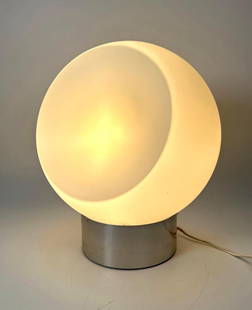 ROBERT SONNEMAN MID-CENTURY MODERN CHROME AND GLASS CRESCENT GLOBE TABLE LAMP: A Robert Sonneman table lamp with a spherical, frosted glass shade featuring a crescent-shaped opening mounted on a cylindrical chrome base.  Dimensions: 12.5&#34;h x 10&#34;dia x 8&#34;d  Artist or M