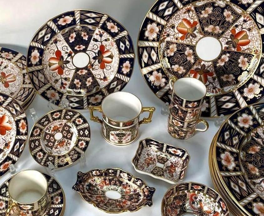 34 PIECE COLLECTION OF ROYAL CROWN DERBY CHINA TRADITIONAL IMARI PATTERN 2451: A collection of Royal Crown Derby Traditional Imari Pattern 2451 dinnerware. Dimensions: 34 PIECE SET INCLUDES: 6 SAUCERS 4.5"DIA 6 TEACUPS 2.25"DIA 6 APPETIZER PLATES 7"DIA (1 W/ FLEA BI