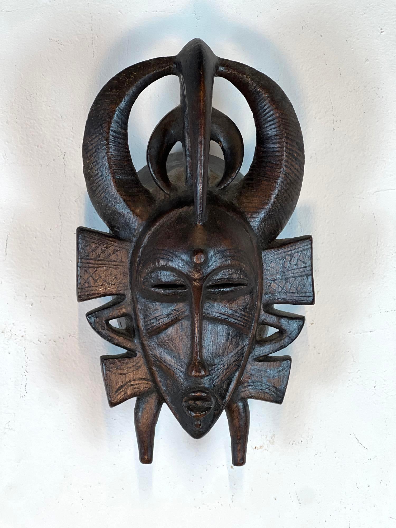 WOODEN SENUFO PEOPLES KPELI FACE MASK (1 of 8)