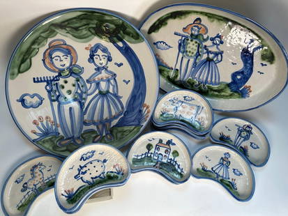 HAND-PAINTED FOLK ART CERAMIC DINNERWARE SET SIGNED M.A. HADLEY: A hand-painted folk art ceramic dinnerware set, signed by M.A. Hadley. The set includes 1 large plate, 1 oval platter, and 11 crescent-shaped individual dishes, all featuring charming hand-painted des