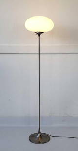 MID CENTURY ICONIC MUSHROOM FLOOR LAMP BY BILL CURRY FOR LAUREL LAMP CO.: A Mid-Century Modern floor lamp featuring a tall, slender metal stem, holding a mushroom shaped white glass shade, supported by a round metal base.  Dimensions: 57&rdquo; T  Artist or Maker: Bill Curr