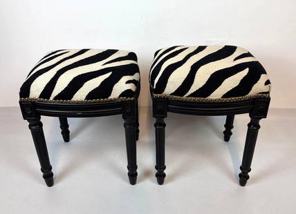 UNUSUAL NEAR PAIR OF NEEDLEPOINT ZEBRA PATTERN UPHOLSTERED OTTOMANS / STOOLS WITH NAILHEAD TRIM: A near pair of woven zebra print upholstered ottomans/stools, accented with nail head trim. Dimensions: 15.5" X 14" X 19" TALL Artist or Maker: In the style of or likely Ballard Designs. Provenance