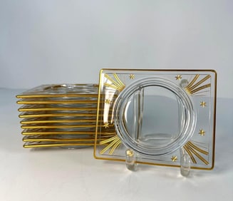 SET OF TEN GILDED STARBURT MOTIF GLASS COASTERS / PLATES