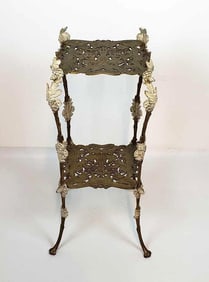 ANTIQUE FRENCH ART NOUVEAU STYLE GILT AND PAINT DECORATED CAST IRON TWO-TIER STAND