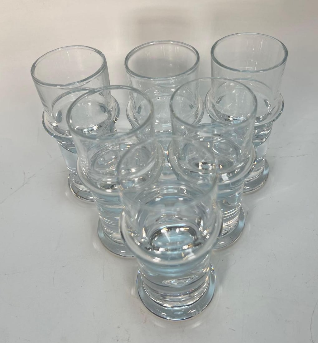 VALUE LOT SET OF SIX HOLMEGAARD CLEAR GLASS SHOT GLASSES/SHERBERT DISHES: *A set of six Holmegaard clear glass shot glasses/sherbert dishes. Dimensions: 4" TALL Artist or Maker: Holmegaard Provenance: The Living Estate of Joseph Rodano Notes: Although care is t